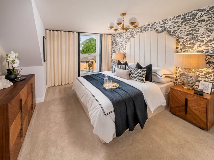 a bedroom with a bed and a table