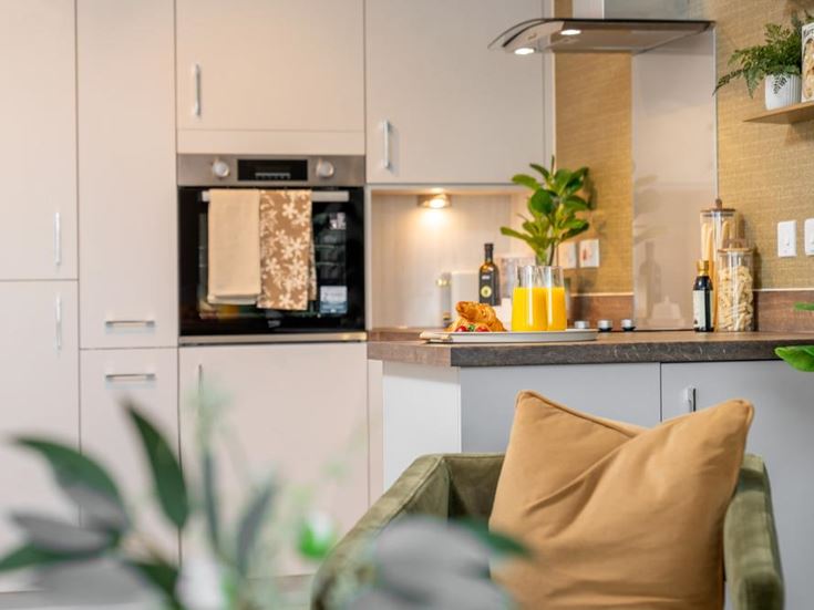 a kitchen with a stove and oven