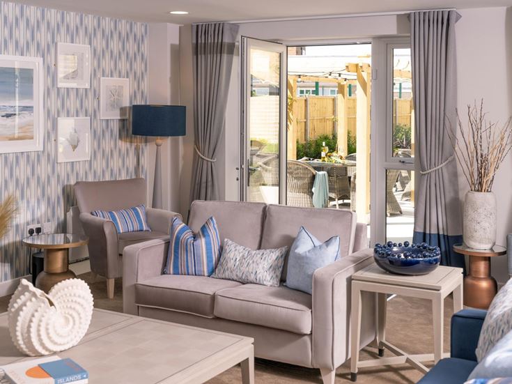 a living room with a large glass door