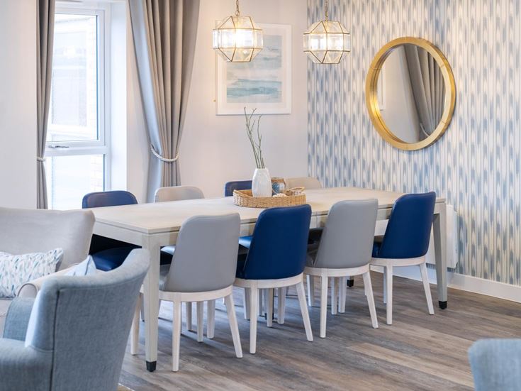 a dining room with a round table