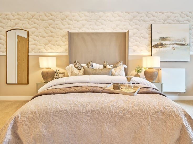 a bed with a large mirror