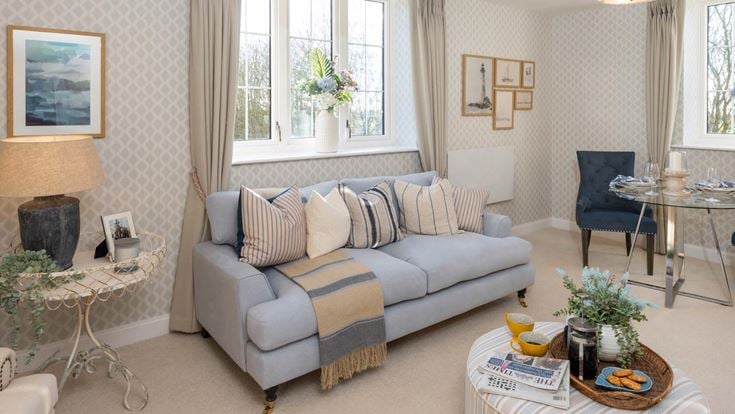 a living room with a couch and table
