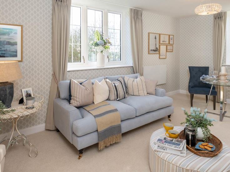a living room with a couch and table