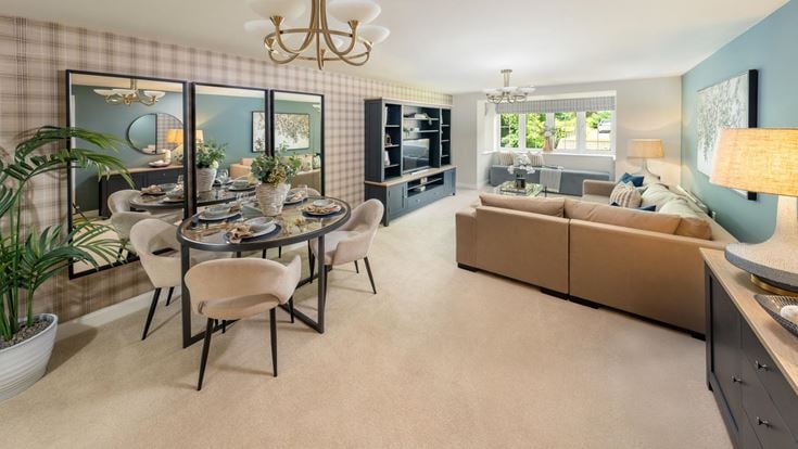 a living room with a couch and a table