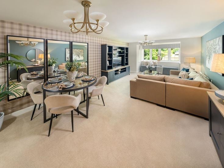 a living room with a couch and a table