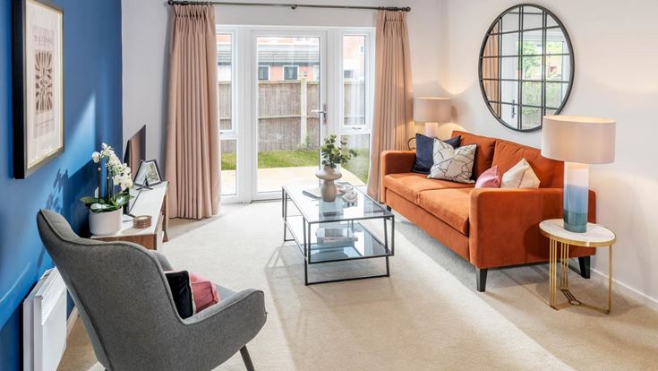 a living room with a large mirror