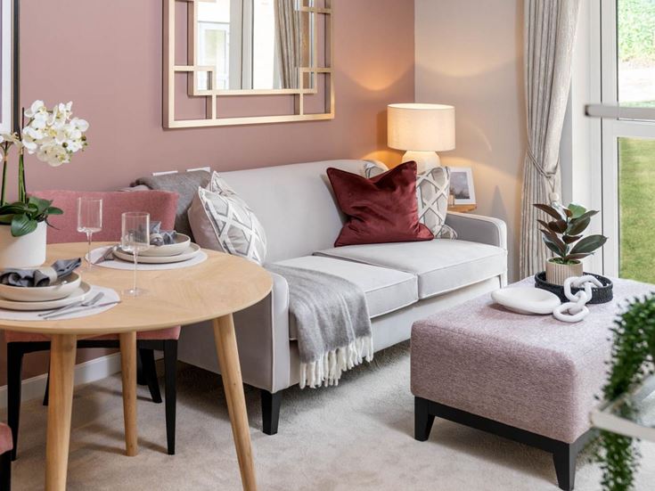 a living room with a couch and a table
