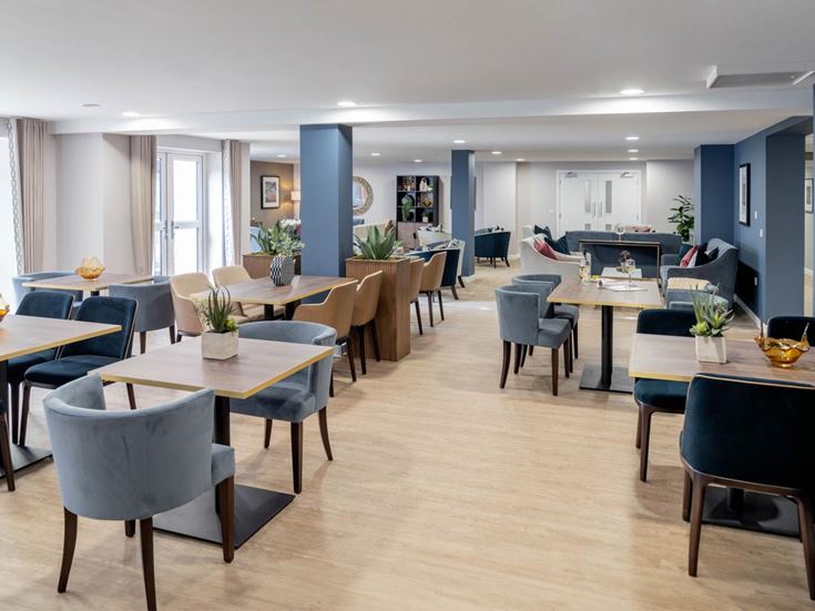 a room with tables and chairs