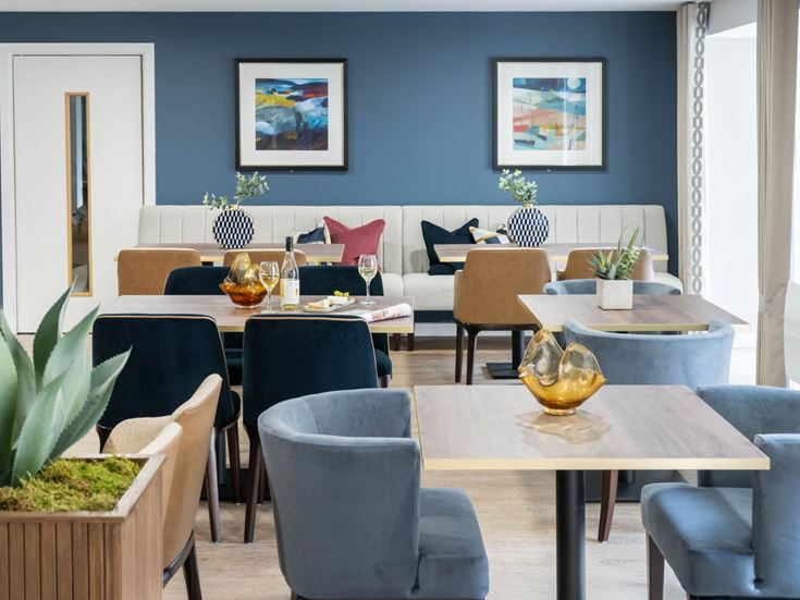 a room with tables and chairs