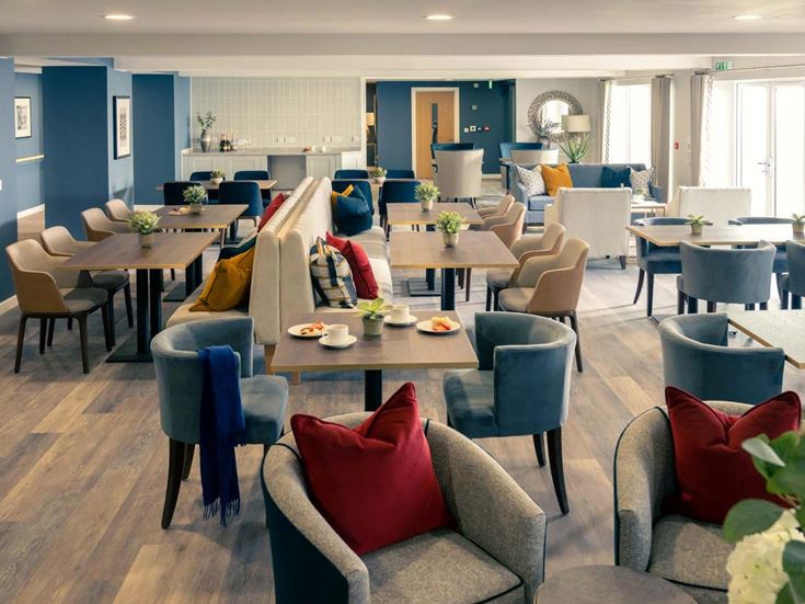 a room with tables and chairs