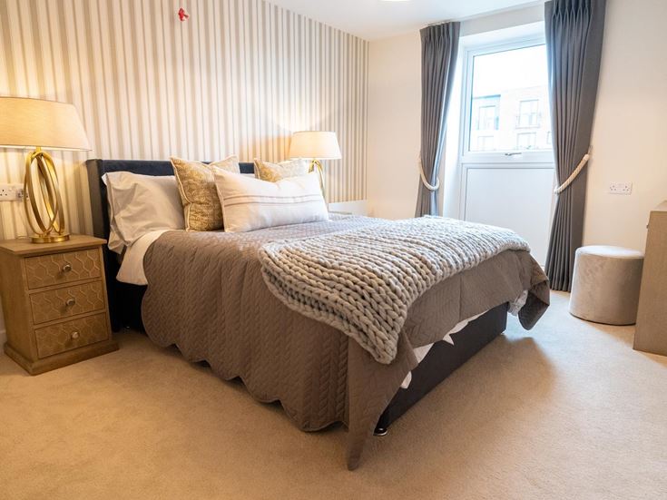 a bed with a blanket on it