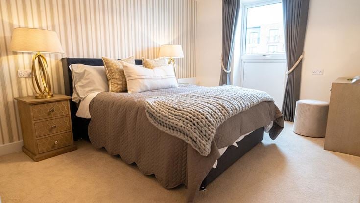a bed with a blanket on it