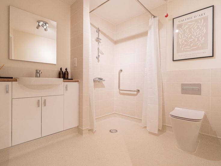 a bathroom with a toilet and sink