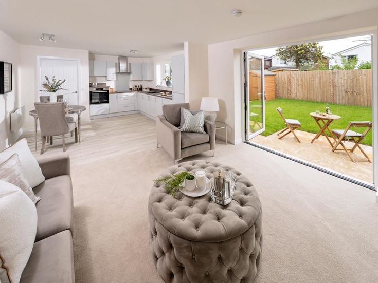 a living room with a large glass door