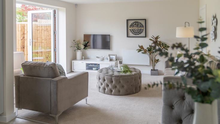a living room with a couch and a table