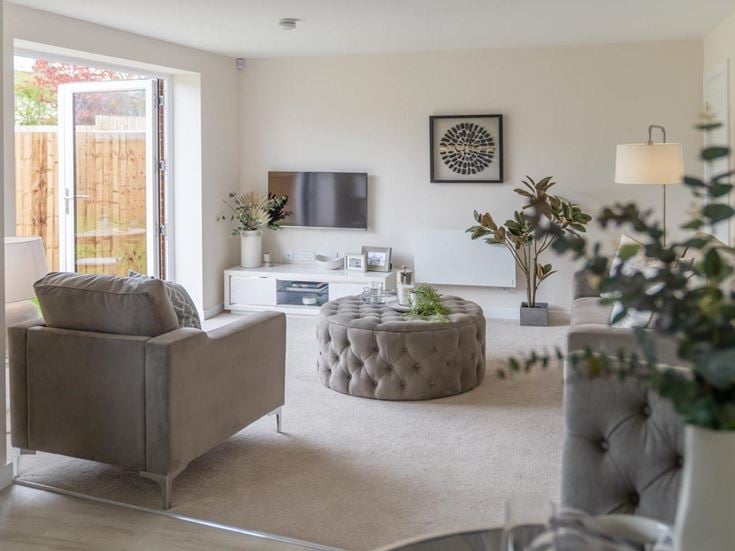a living room with a couch and a table