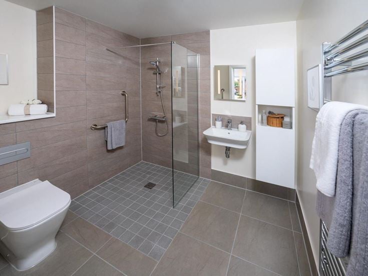 a bathroom with a glass shower