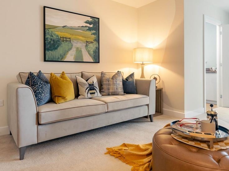 a living room with a couch and a coffee table