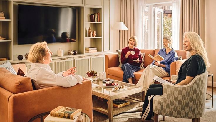 a group of people sitting on a couch