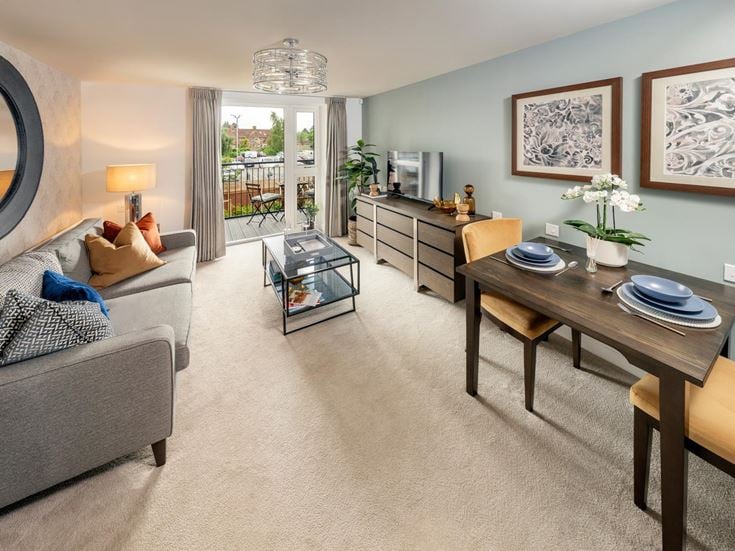 a living room with a couch and a coffee table