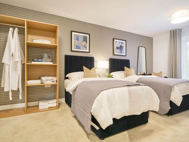 a bedroom with two beds