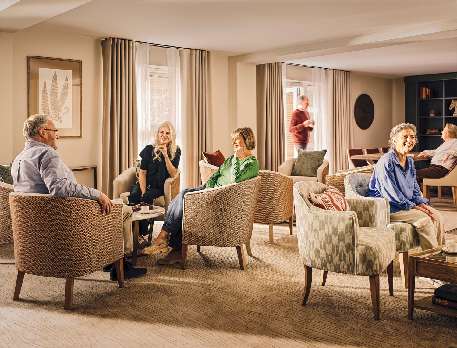 a group of people sitting in chairs