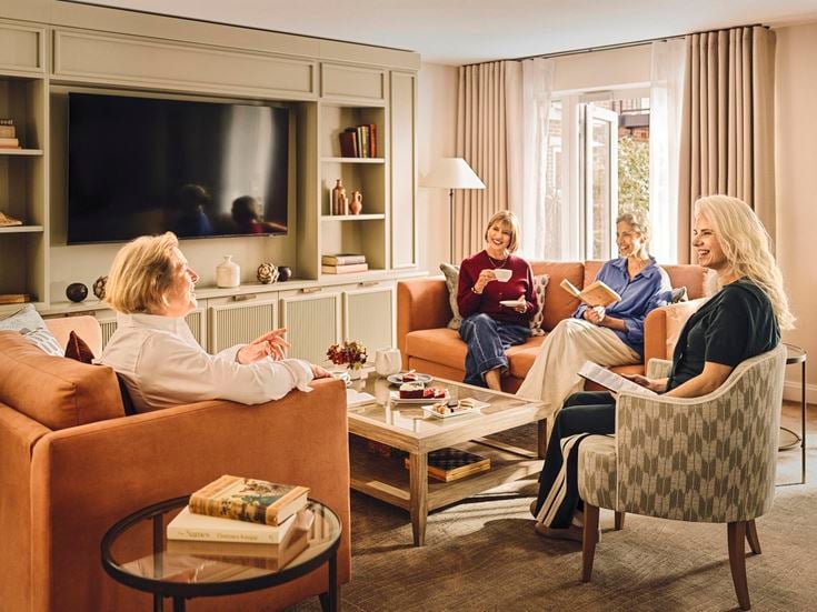 a group of people sitting on a couch