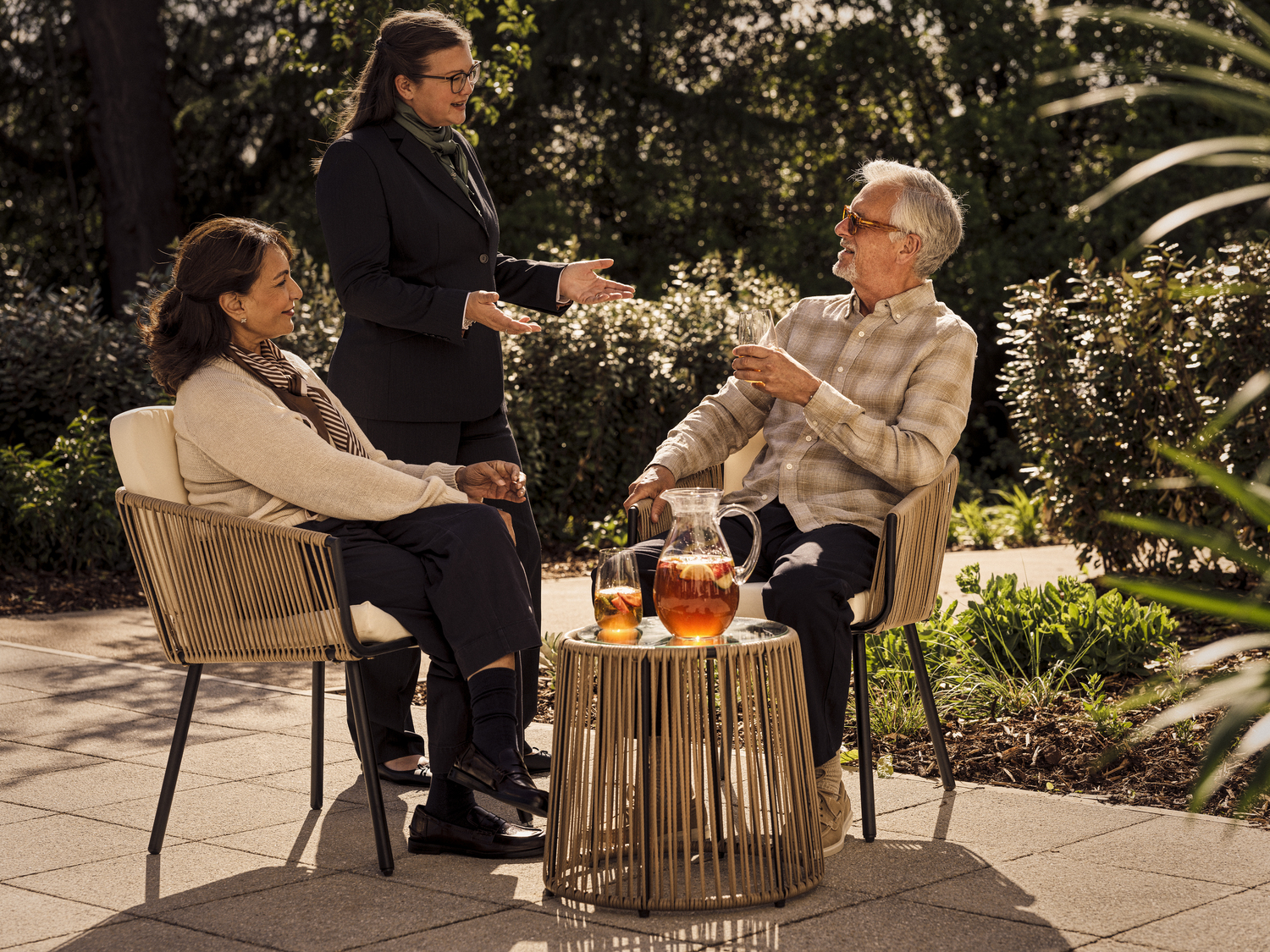 a group of people sitting outside