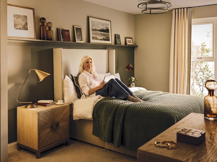 a person sitting on a bed