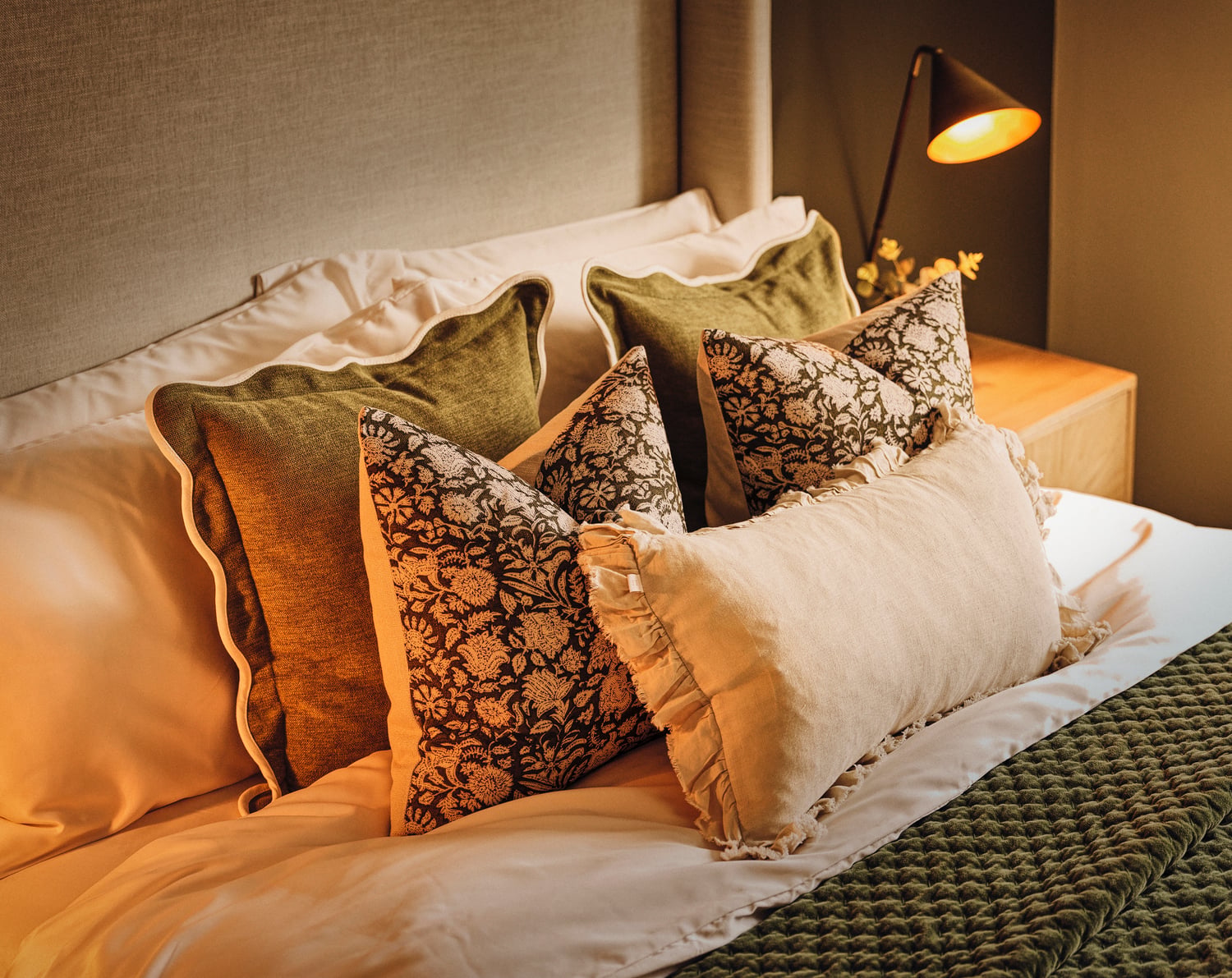 a bed with pillows