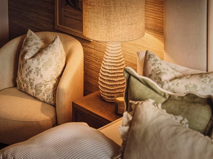 a couch with a lamp on it