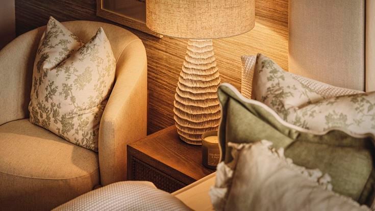 a couch with a lamp on it