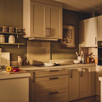 a kitchen with white cabinets