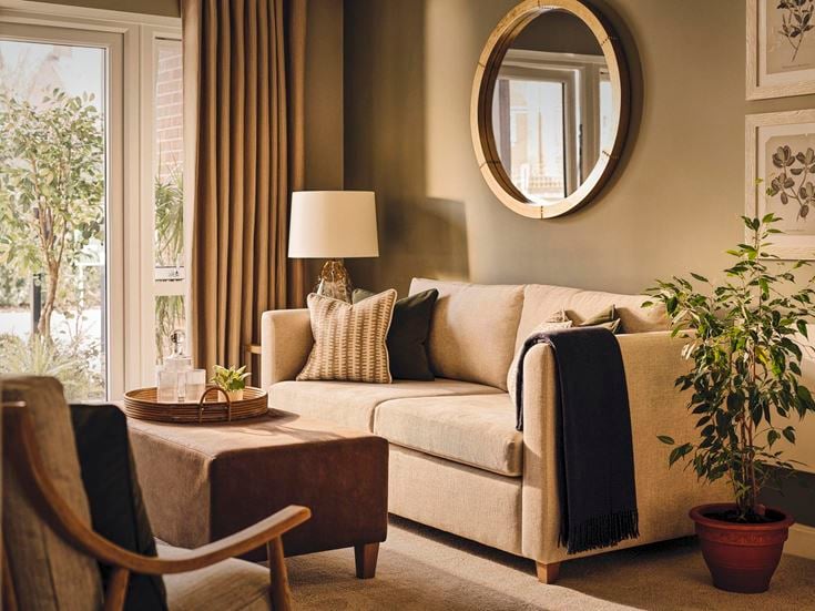 a living room with a couch and a table