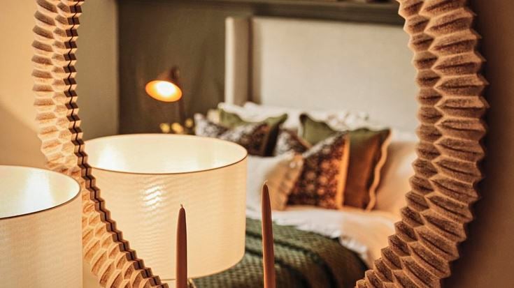 a bed with a lamp