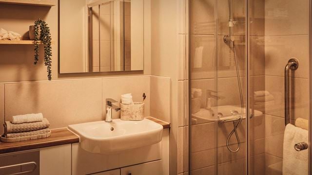 a bathroom with a glass shower