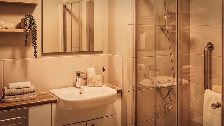 a bathroom with a glass shower