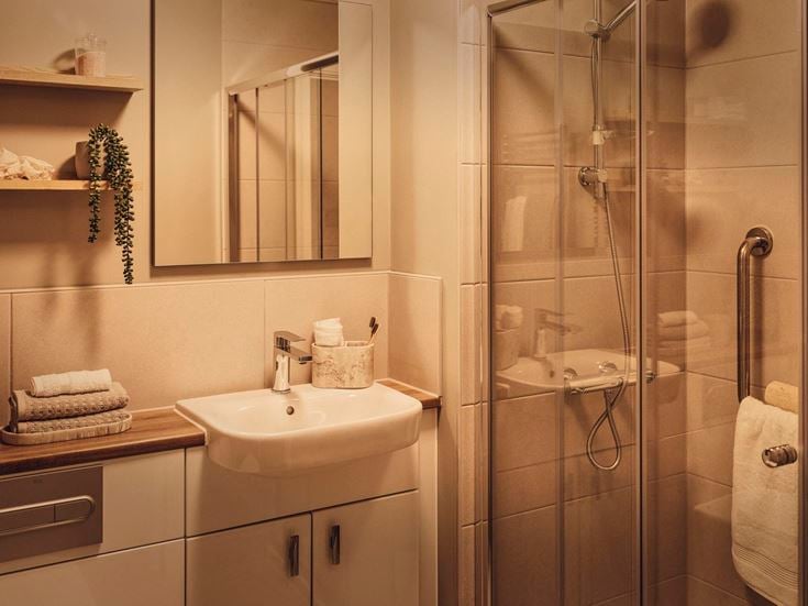 a bathroom with a glass shower