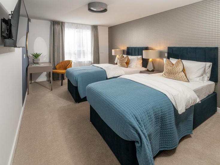 a room with two beds