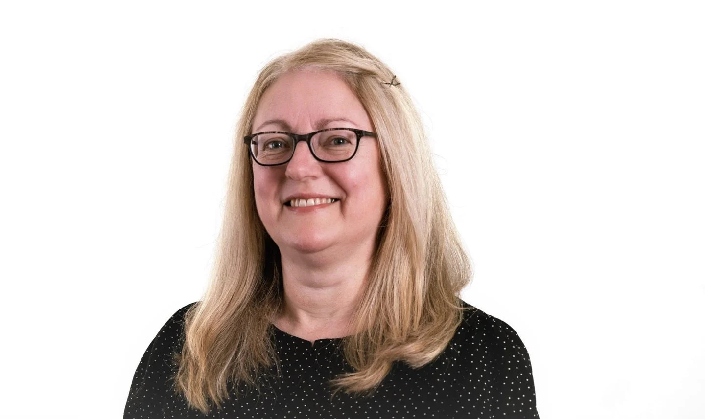 a woman wearing glasses