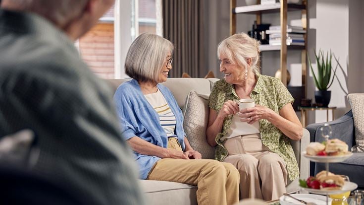 a group of people sitting on a couch