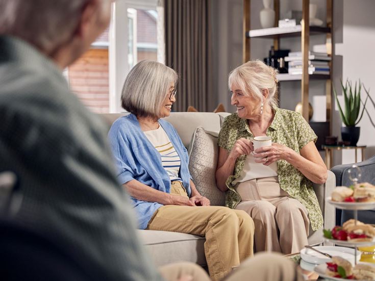 a group of people sitting on a couch