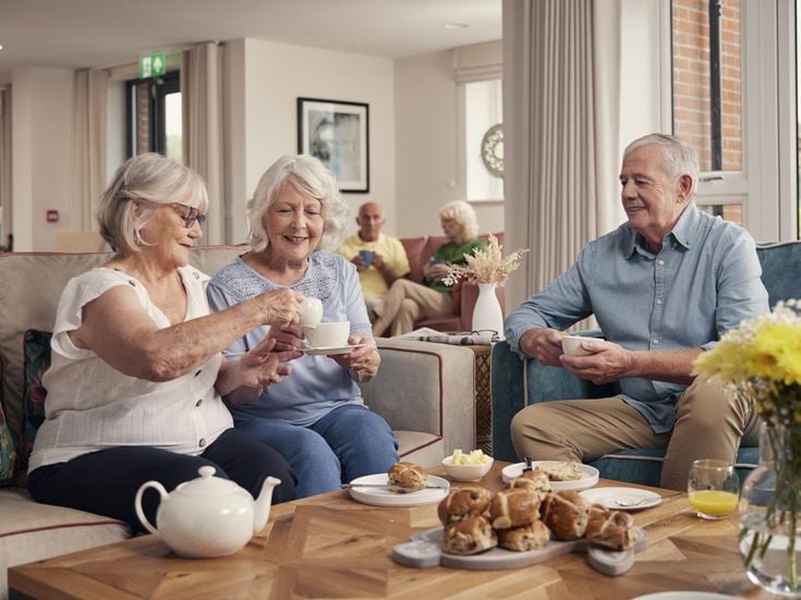 a group of people sitting on a couch