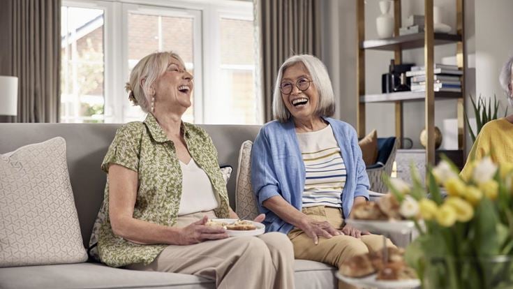 a couple of women laughing