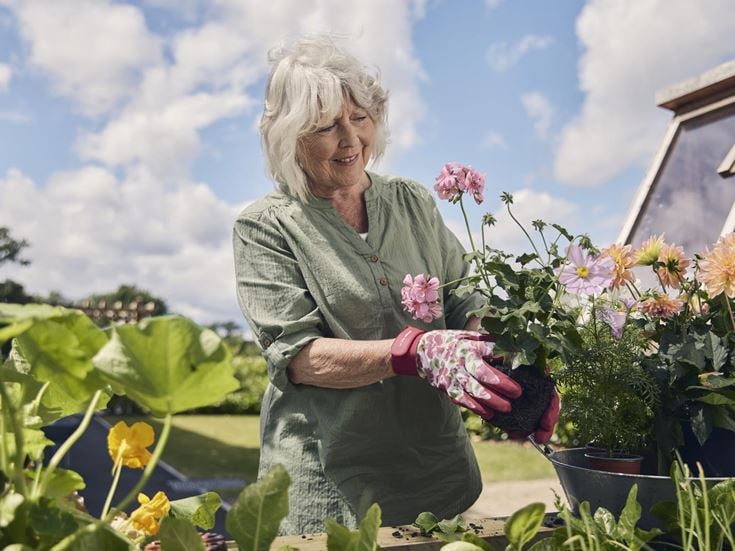 a person holding flowers