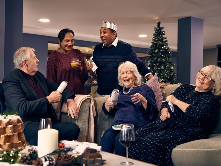 a group of people sitting around a table
