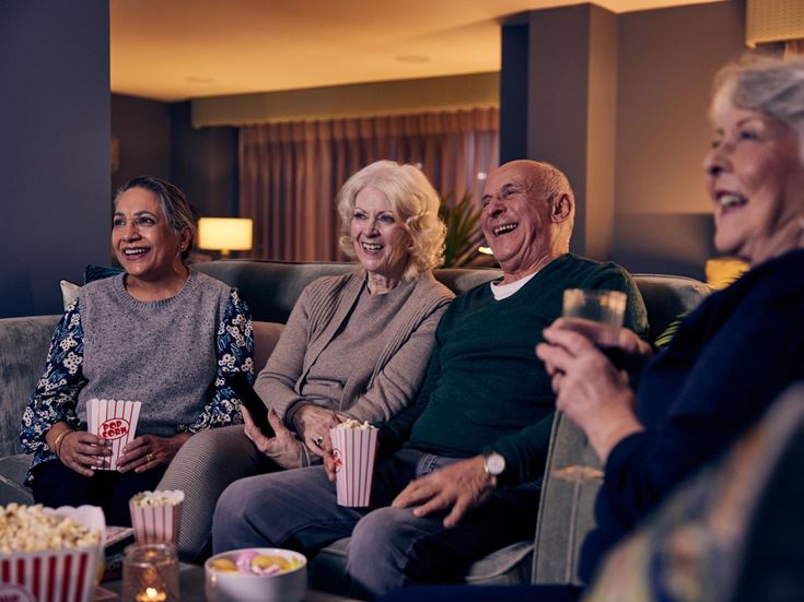 a group of people sitting on a couch