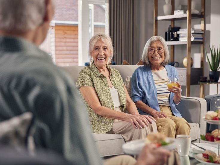 a group of people sitting in chairs