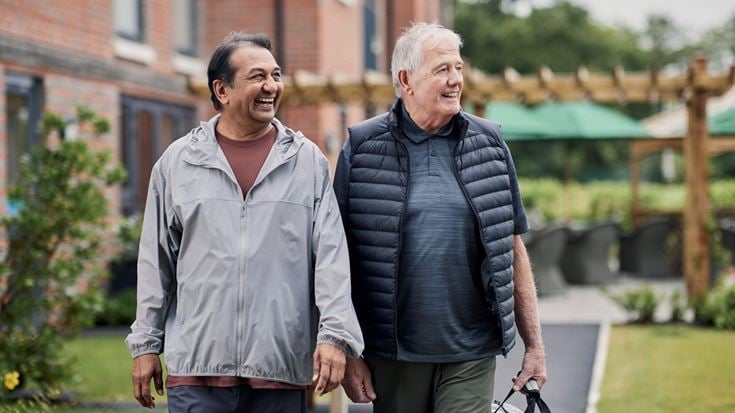 a couple of men walking