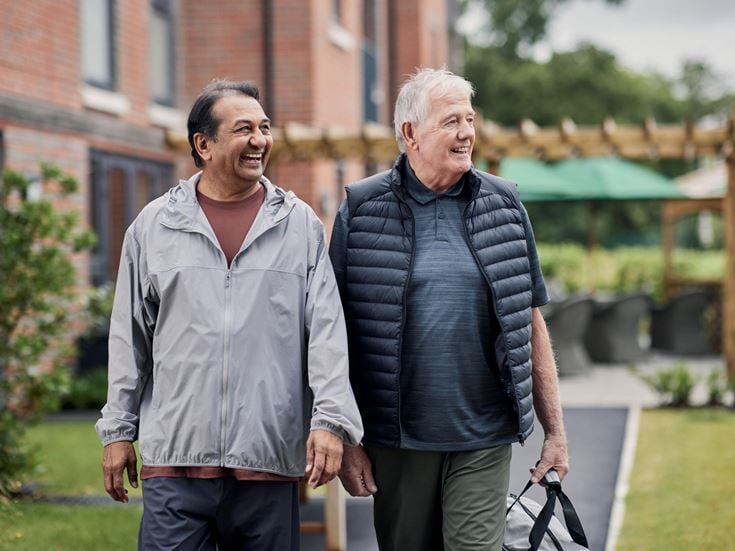 a couple of men walking